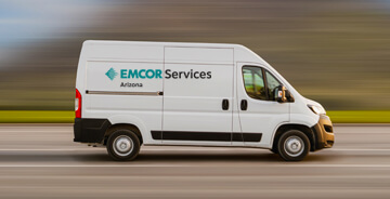 EMCOR Services Arizona service fan driving on a highway